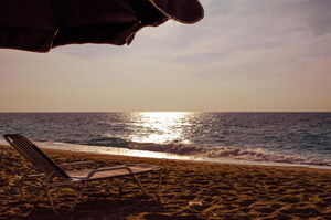 Kathisma Beach interesting caves and niches to discover, or marvel at the magnificent sunset. Best beach near me