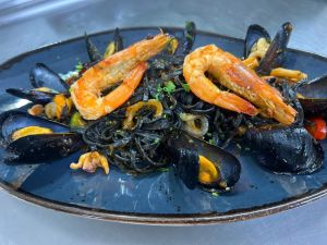 Fresh pasta with cuttlefish ink & seafood - Poseidon Bay Vasiliki