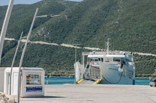 Ticket office and ferry of the Vasiliki - Fiscardo line.