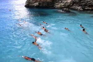 Vasiliki run swimm part at Agiofili Beach